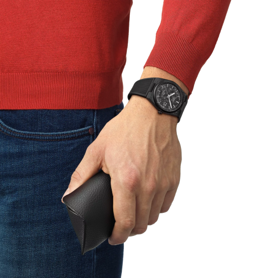 Tissot PRX automaat in het carbon met rubber band - 41085